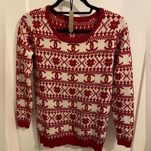 Gorgeous Chanel Christmas sweater. Perfect for your next holiday party.